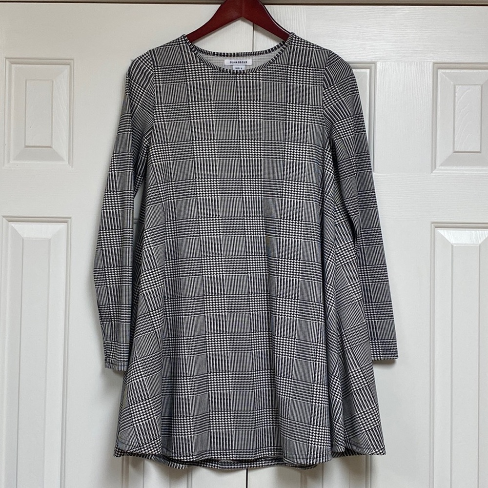 Glamorous - size Small - like new condition. From no smoking & pet free home.